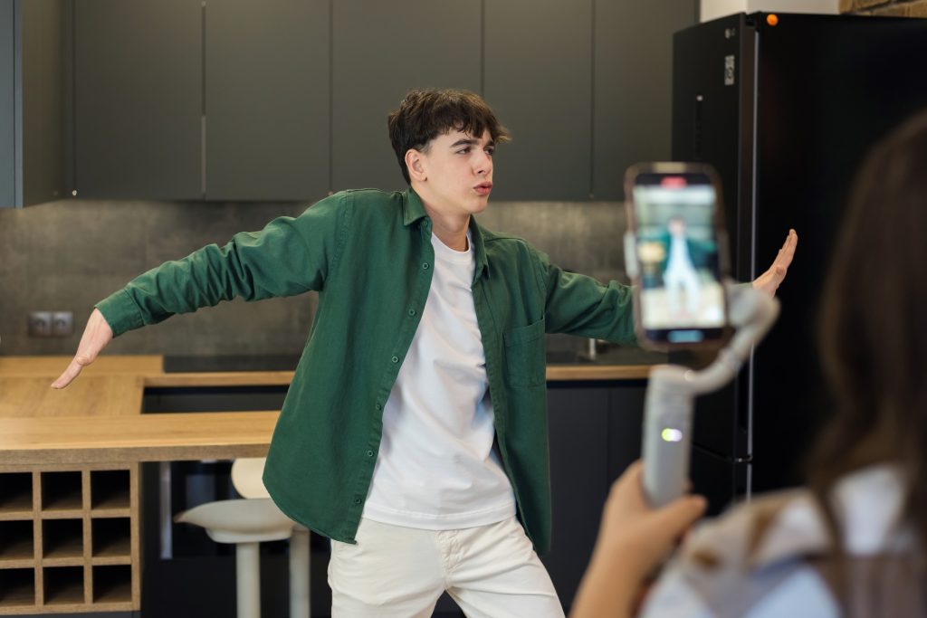 A person recording blogger influencer